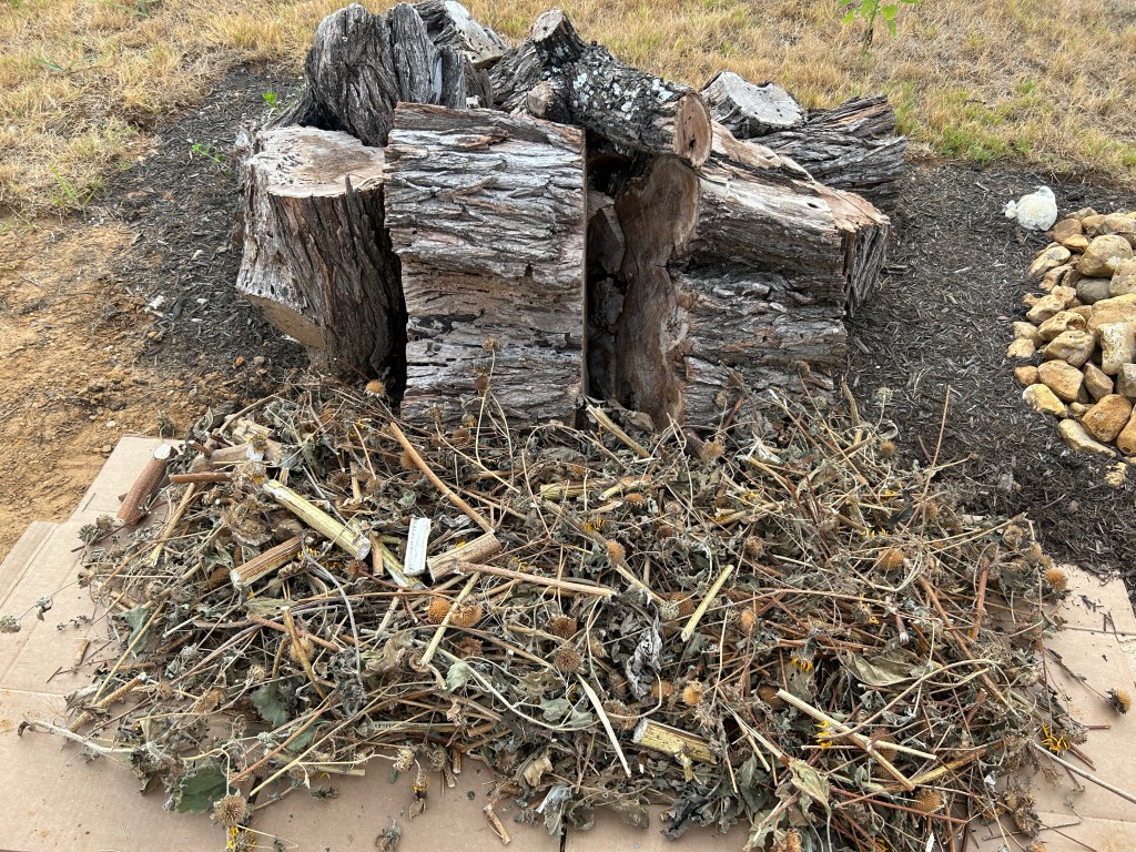 Logs and chopped up plants